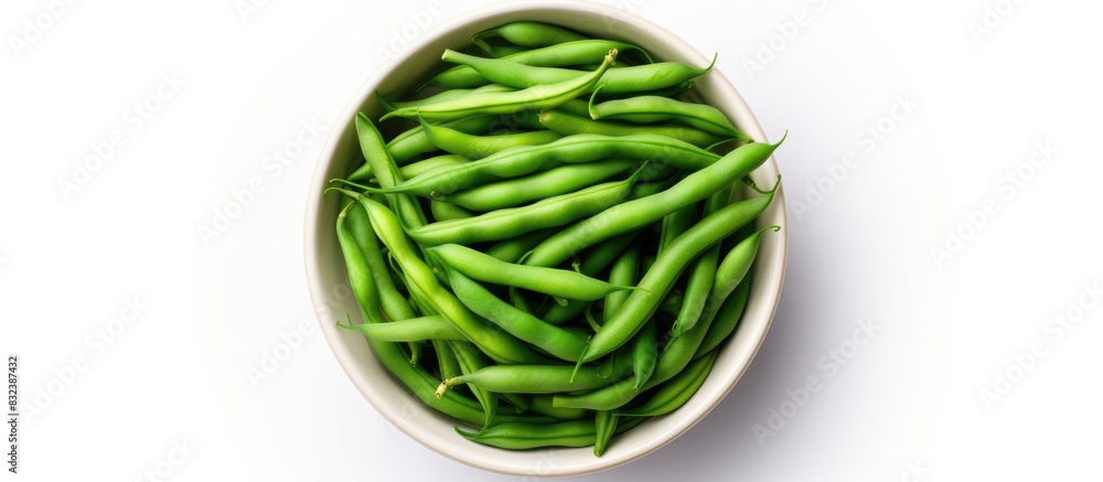 Poster green beans in a bowl on white background top view copy space