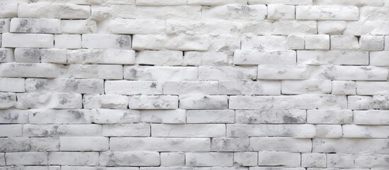 Fototapeta premium White brick background with bumpy and rough texture. copy space available