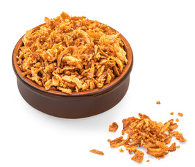 Crispy fried onion flakes in a bowl  isolated on white background. Crunchy Scattered Dry Onion Pieces close up.