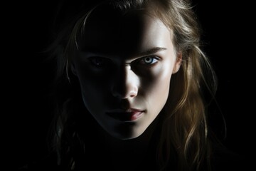 Woman with blue eyes and long hair