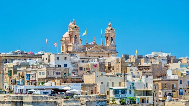 The Basilica of the Nativity of Mary rising over Senglea, Valletta, Malta, Mediterranean