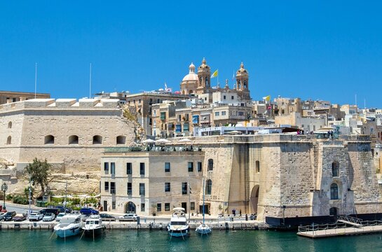 The Basilica of the Nativity of Mary rising over Senglea, Valletta, Malta, Mediterranean