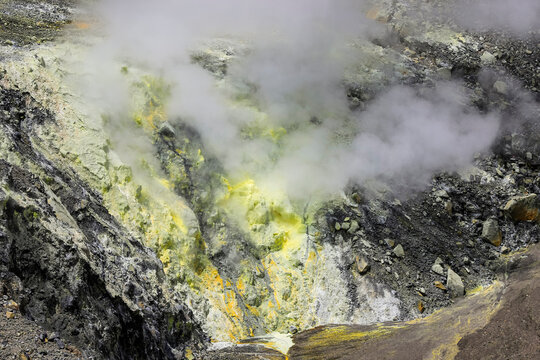 Steaming fumarole with sulphur deposits in Tompaluan active crater by Mount Lokon volcano near Tomohon city, Gunung Lokon, Tomohon, North Sulawesi, Indonesia
