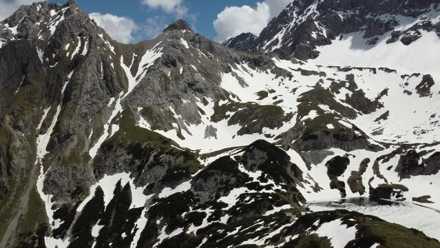 Aerial drone view of snow covered Alps in Ehrwald, Austria