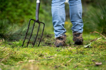 farmer holding soil looking at soil carbon in the america