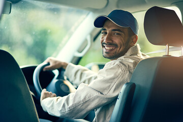 Portrait, driver or delivery man with smile for safety on cargo, stock or package in van in...