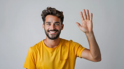 Naklejka premium Man Wearing Yellow Shirt Smiling and Waving Against Plain Gray Background. Generative AI