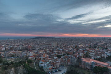 Fototapeta premium sunset in Barcelona against the backdrop of the city