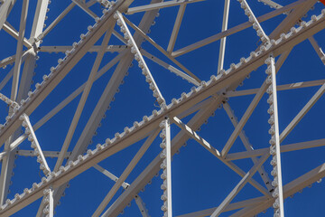 Ferris wheel on a background blue sky