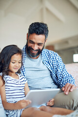 Father, girl and tablet on sofa, happy and relax together for reading, games or cartoon show on web. Dad, daughter and digital touchscreen for movies, video streaming or subscription on lounge couch