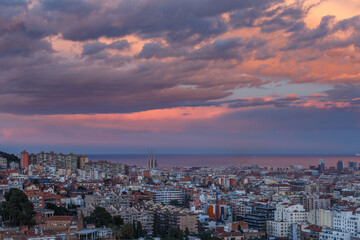 sunset in Barcelona against the backdrop of the city