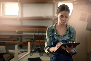 Craft, woman and clipboard in workshop for wood, planning and stock inspection with writing....