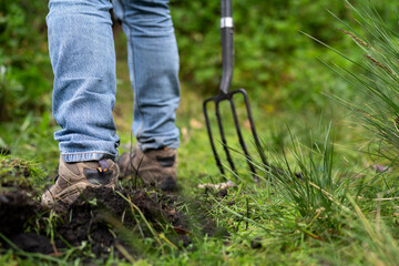 farmer holding soil looking at soil carbon in the america