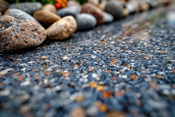 Close up of smooth pebbles on a beach with artistic lighting, showcasing the natural beauty and textures of the stones in a tranquil setting