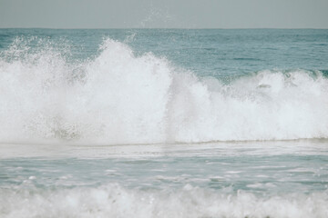wave breaking on the beach