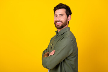 Fototapeta premium Profile photo of nice young man folded hands empty space wear shirt isolated on yellow color background