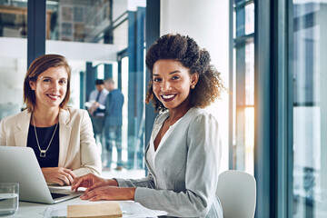 Office, smile and portrait of women together at desk for research, teamwork and laptop with financial advisor. Strategy, confidence and people in b2b meeting for proposal, online planning and support