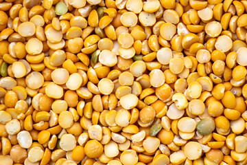 Split pea background. Food background of legumes.