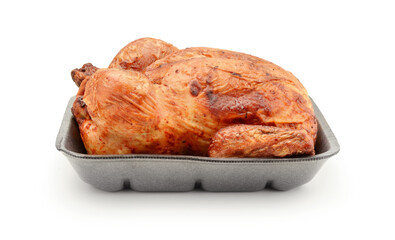 Grilled chicken in a plastic tray isolated.