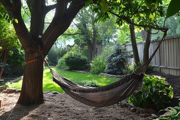Immerse yourself in a dreamy backyard scene with a hammock swing suspended from a sprawling oak tree, creating a serene spot for relaxation and daydreaming