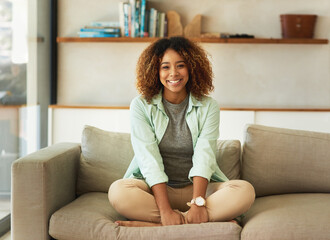 Woman, home and relax on sofa with smile and portrait, support, legs crossed for comfort with free time. Female person, peace and couch for wellness in living room, calm and happiness for day off