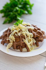 fried liver waffles with onions and herbs