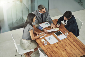 Meeting, discussion and business people with paperwork in office for review, budget report or project proposal. Lens flare, corporate consultant and staff for conversation, sales graph or teamwork