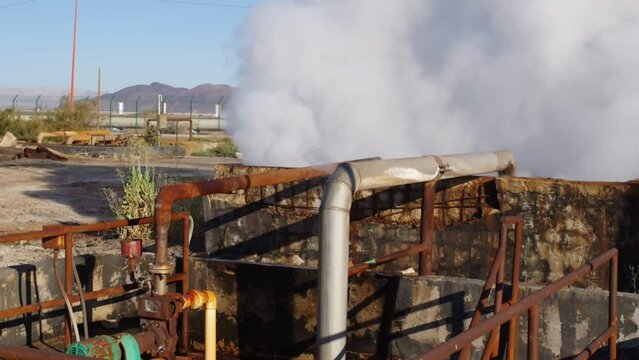 geothermal well in venting maneuvers when opening the valve for the release of steam, Cerro Prieto Baja California Mexico.