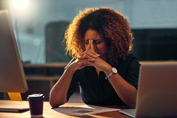 Stressed out, black businesswoman and working late night on laptop for work deadline with problem....