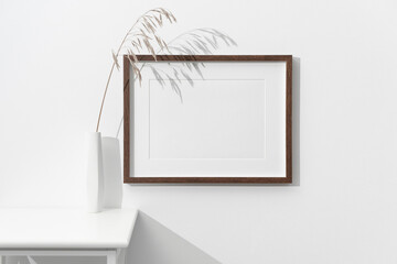 Blank wooden picture frame mockup with botanical decor, horizontal art frame mock up with copy space