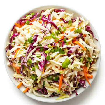 Top view of a bowl of coleslaw with creamy dressing isolated on white background 