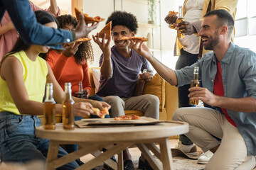 Friends Sharing Pizza and Drinks at a Home Partycurvy, curvy, multiracial, african american, hispanic, latin american, generation z, millennial generation,