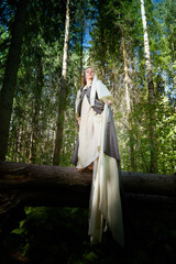 Beautiful seductive dryad. Pagan spirit of the forest. Portrait of beautiful dryad. Fairy who loves...