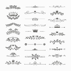 A collection of ornate design elements, primarily in the form of decorative dividers or borders. These designs are symmetrical and feature a mix of floral and crown motifs. They are positioned horizon