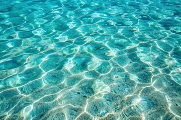 Obraz premium Gentle waves of the sea surface with the reflection of the blue sky.