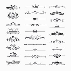 A collection of ornate design elements, primarily in the form of decorative dividers or borders. These designs are symmetrical and feature a mix of floral and crown motifs. They are positioned horizon