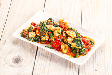 Chicken with tomato and spinach