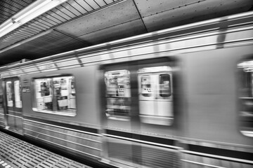 Osaka, Japan - May 28, 2016: Subway train speeding up