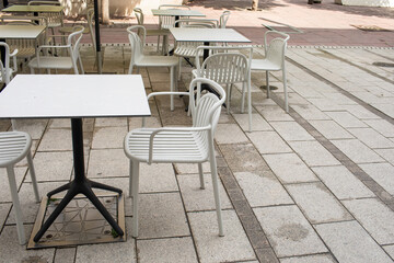 Restaurant outdoor terrace in city centre.Summer season. High quality photo
