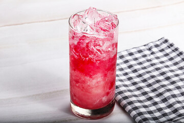 Cold strawberry cocktail with ice