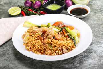 Asian cuisine - Fried noodles with seafood