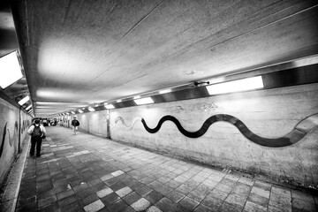 Osaka, Japan - May 26, 2016: City underpass with local people