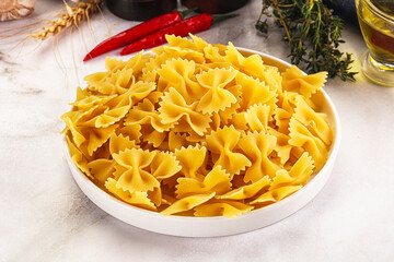 Raw dry Italian pasta - farfalle