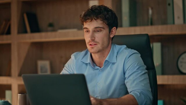 Successful programmer closing laptop satisfied online project late home close up