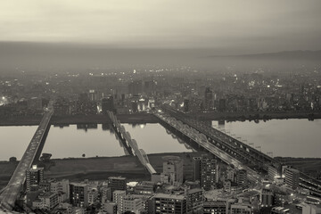 City skyscrapers and skyline at night in Osaka, Japan