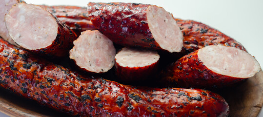 Traditional pork sausage smoked over wood, handcrafted meat product