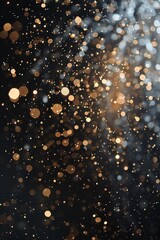 Obraz premium Elegant gold and white bokeh lights on a dark background, perfect for festive and celebratory designs.