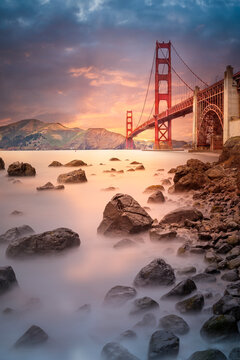 Beautiful view of the glowing Golden Gate in San Francisco after sunset
