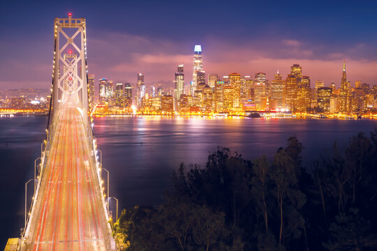 Wonderful view from the height of Oakland Bridge in San Francisco at sunset