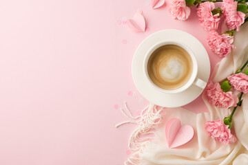 Cup of coffee with pink carnations and a white scarf on a pastel background, decorated with...